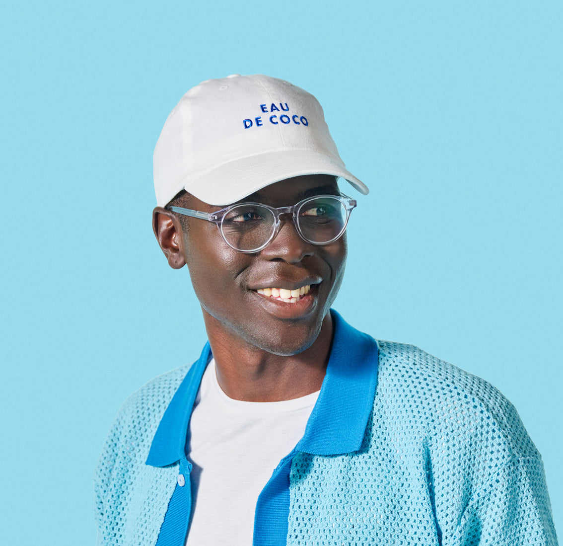 A Vita Coco Eau De Coco baseball Cap person wearing a dad cap.