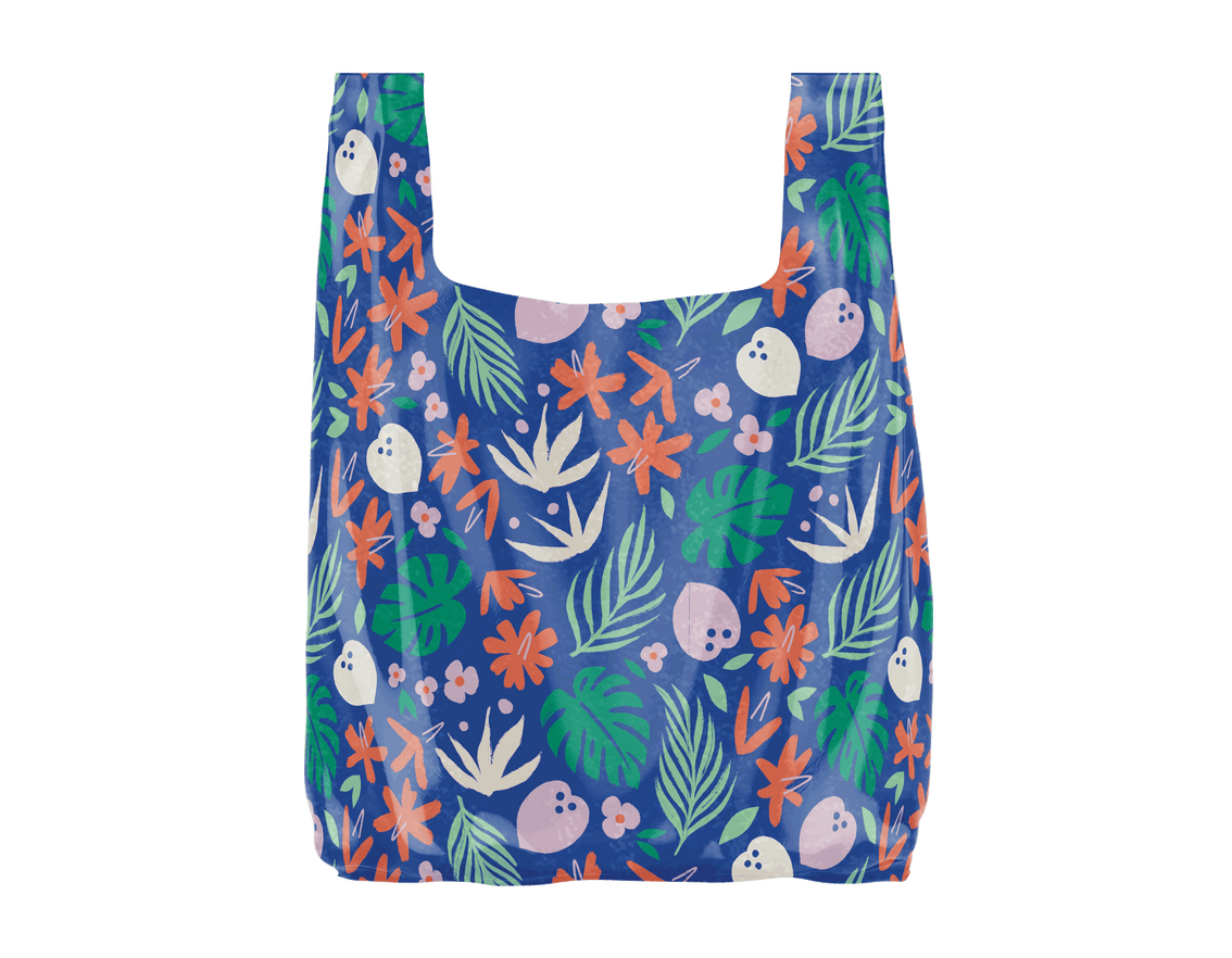 A Vita Coco Patterned Foldable Tote with tropical plants on it, perfect for carrying all your stuff.