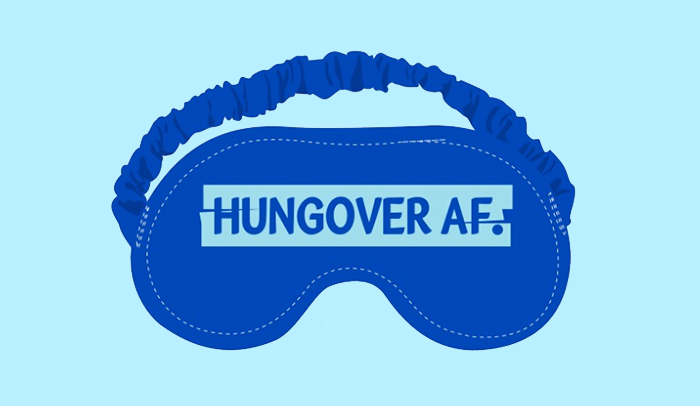 A blue Hangover Subscription: Eye Mask by Vita Coco with the words "hungover af" is the perfect accessory for those mornings after a night out. Made from comfortable and soft materials, this sleep mask blocks out light.